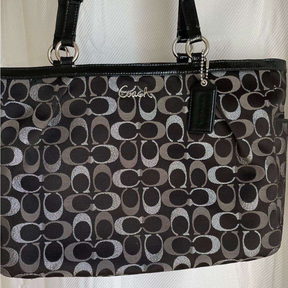 Beautiful coach purse. Gently used, just never carry a purse anymore.